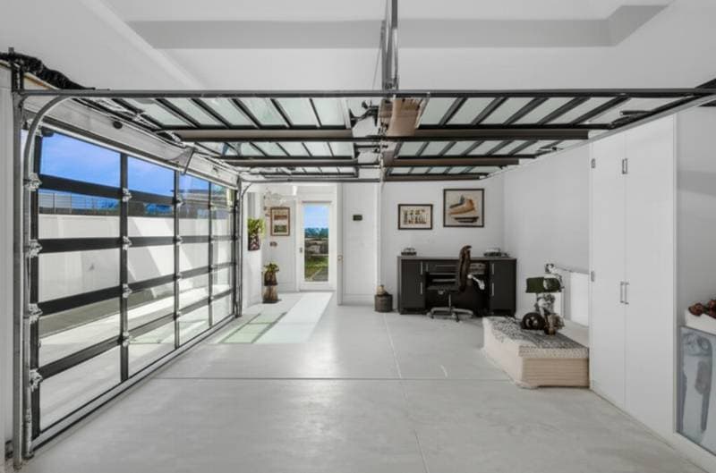 Glass Garage Doors Transform Coastal Homes with Light